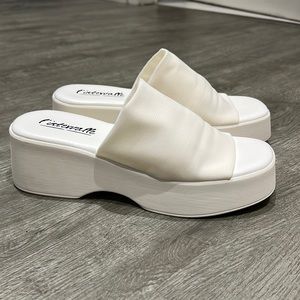 White platform sandals